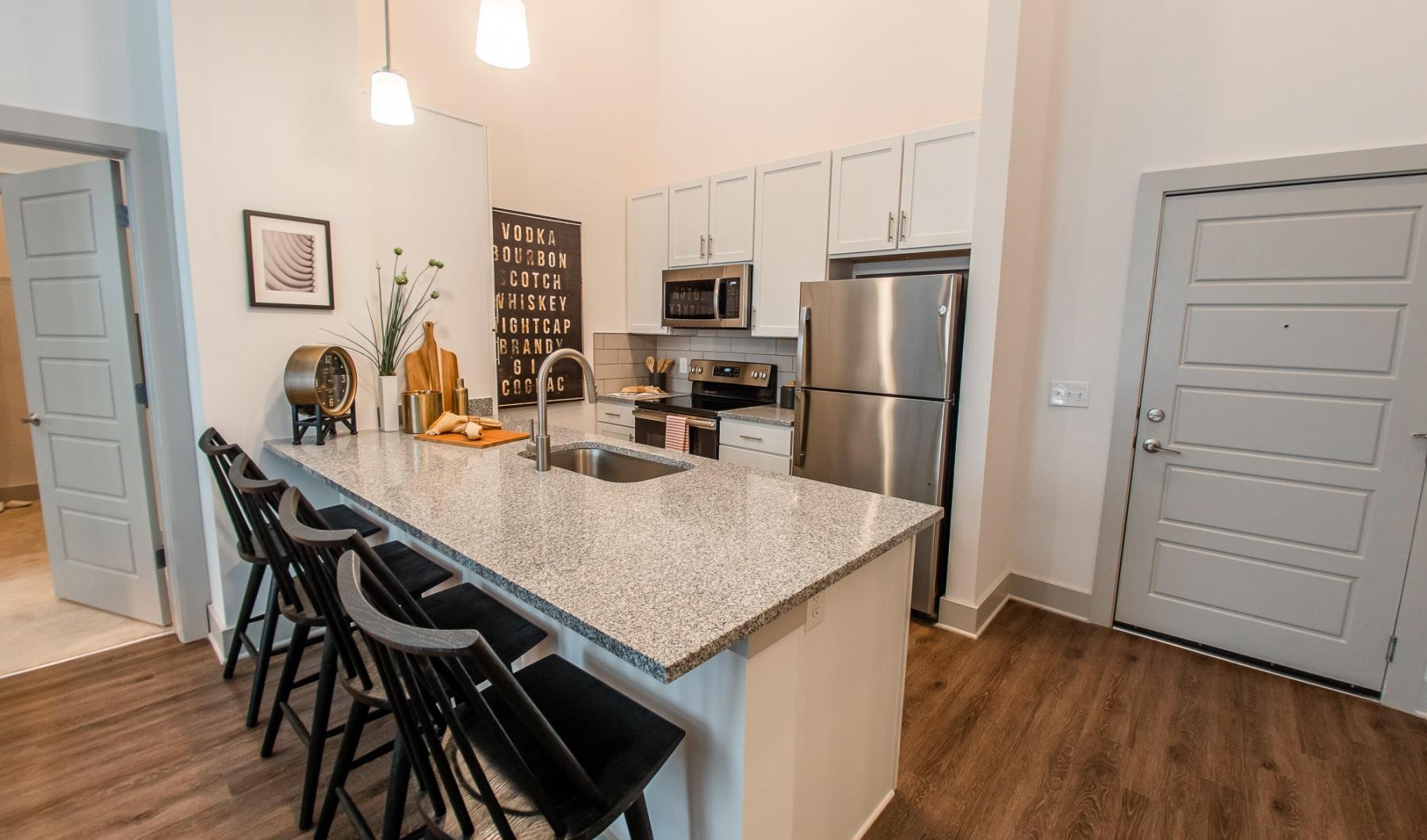 Beautiful kitchens with designer finishes a kitchen with a marble island