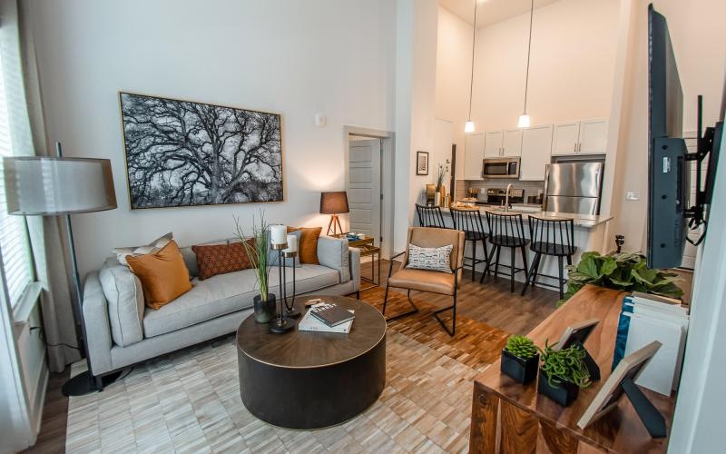 a living room with a couch and coffee table